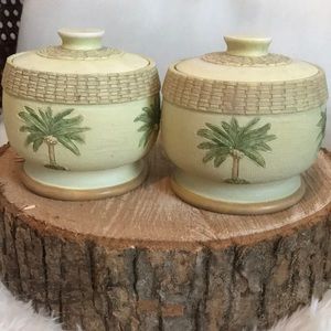 Matching pottery canisters  with matching lids  made from Bora Bora .